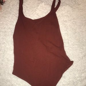 Maroon bodysuit with clasps at bottom